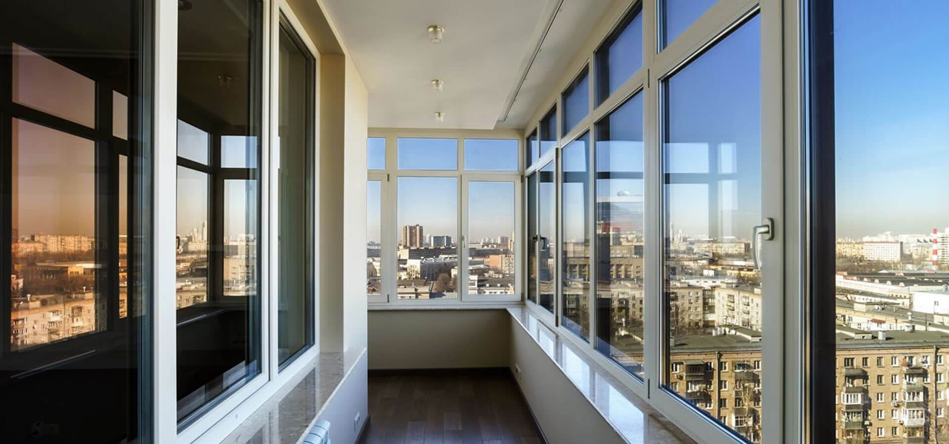 Теплое остекленение балконов REHAU фото